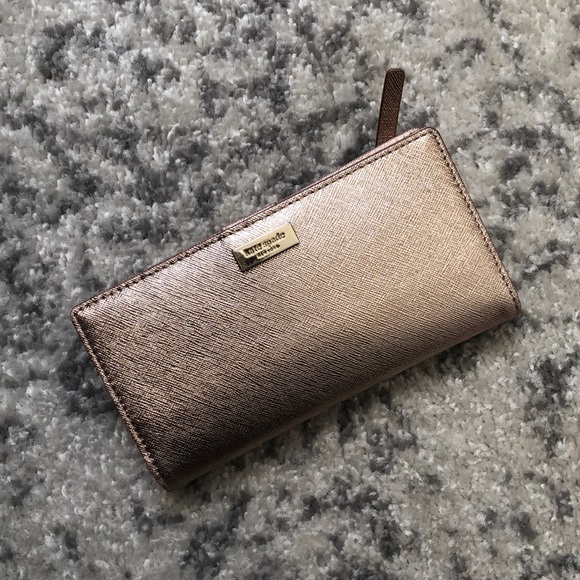kate spade Handbags - Kate Spade Rose Gold Metallic Wallet